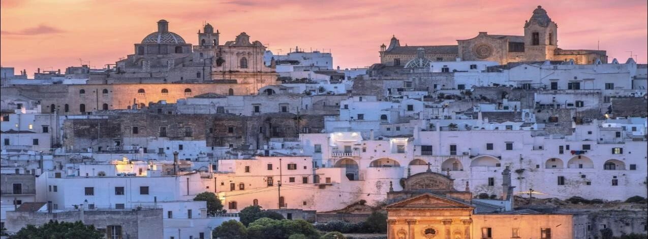 倾听砖瓦间的言语:意大利特朗建筑传奇变迁的壮阔卷轴